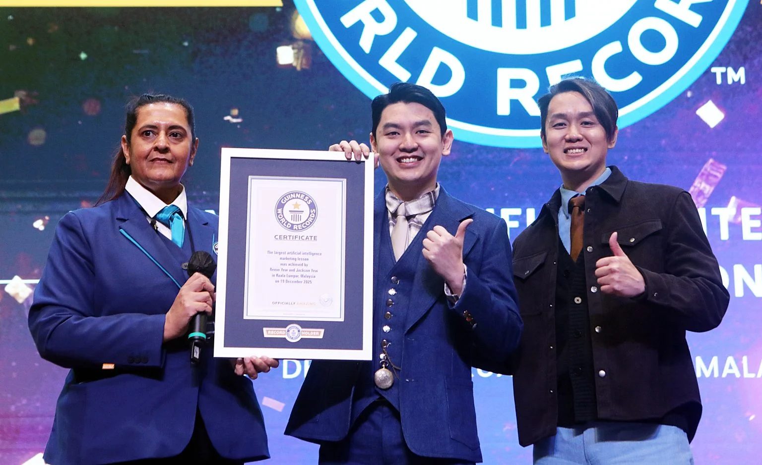 Reeve and Jackson holding the Guinness World Records certificate